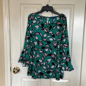 Beautiful light weight blouse.  Green Floral, flowing and forgiving.Like new